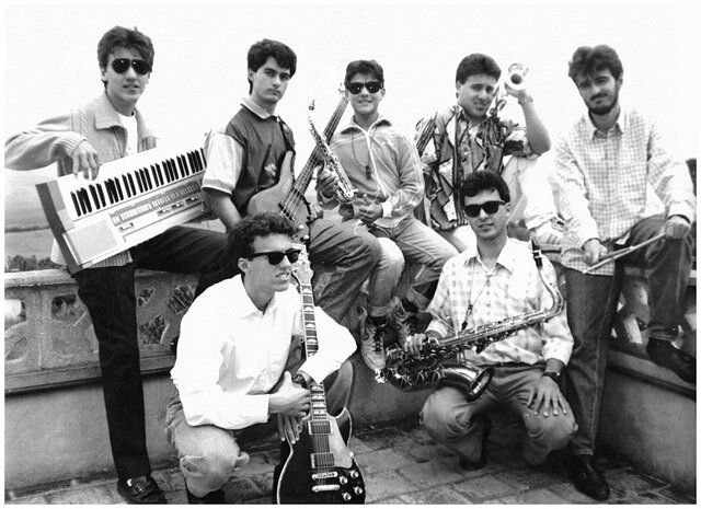 The seven-member Rossello Brothers lineup with keyboards, saxophones and guitar